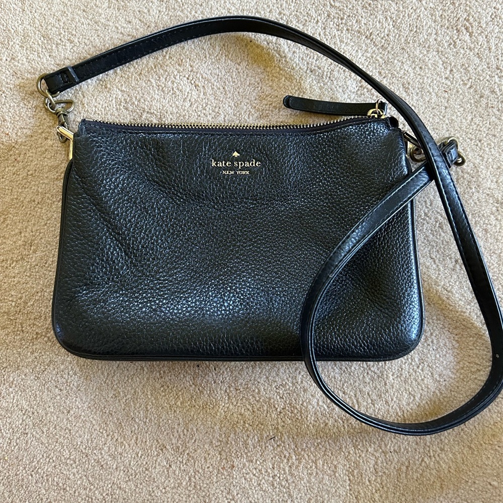 Kate Spade crossbody black pebbled soft leather. Top zip closure. 10” 7”.